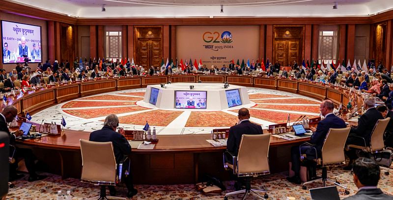 India's prime minister Narendra Modi (C) addresses the G20 Leaders' Summit at the Bharat Mandapam in New Delhi on 9 September, 2023