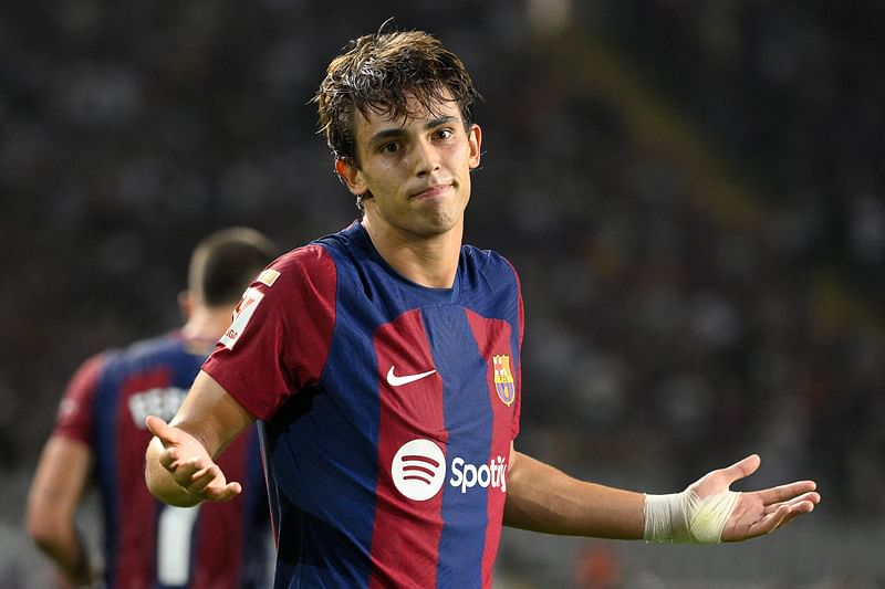 Barcelona's Portuguese forward Joao Felix celebrates after scoring his team's first goal during the La Liga match between FC Barcelona and Real Betis at the Estadi Olimpic Lluis Companys in Barcelona on 16 September 2023