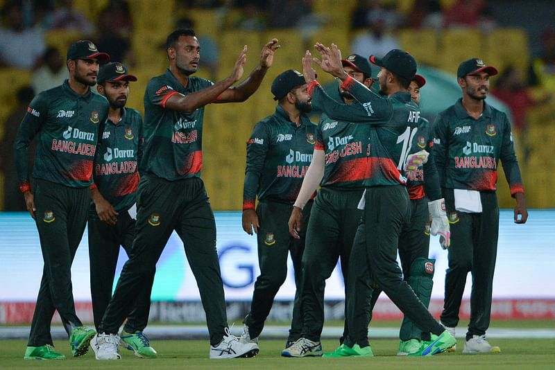 Bangladesh's Shoriful Islam celebrates with teammates after taking the wicket of Afghanistan's Rahmanullah Gurbaz during the Asia Cup 2023 match between Bangladesh and Afghanistan at the Gaddafi Stadium in Lahore on 3 September 2023