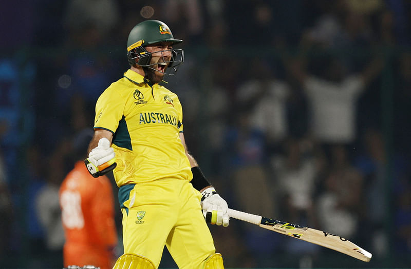 Australia's Glenn Maxwell celebrates after reaching his century