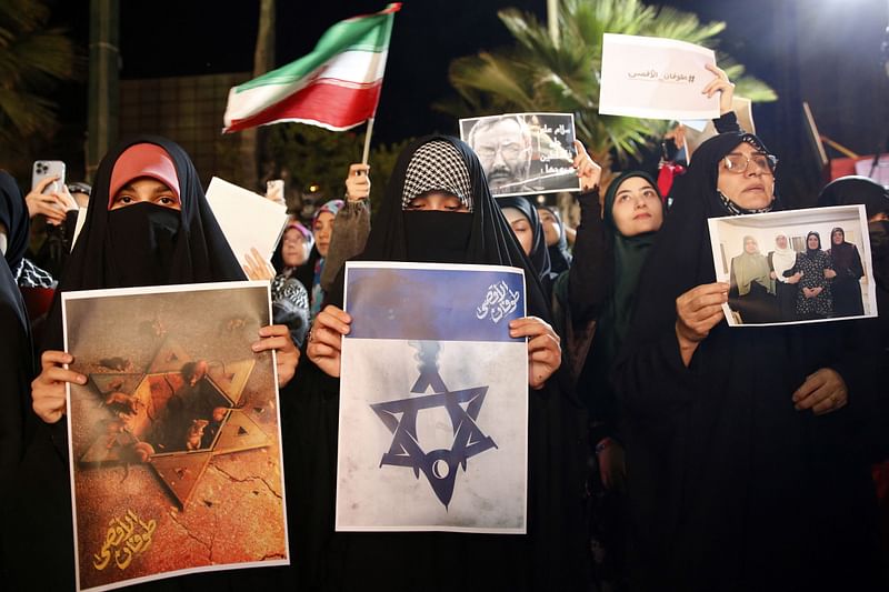 Iranians attend a gathering in Tehran on 7 October, 2023, to express their solidarity with Palestine after Hamas militants launched a deadly air, land and sea assault into Israel from the Gaza Strip