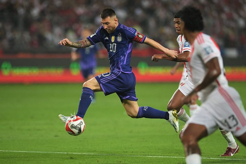 Argentina's forward Lionel Messi controls the ball during the 2026 FIFA World Cup South American qualification football match between Peru and Argentina at the National Stadium in Lima on 17 October, 2023.