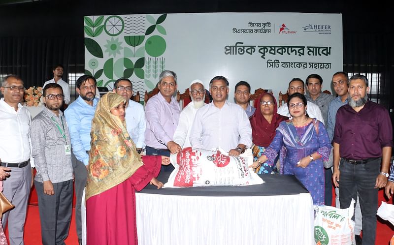 City Bank distributes Poultry and Fish Feed among marginal farmers at Rajshahi