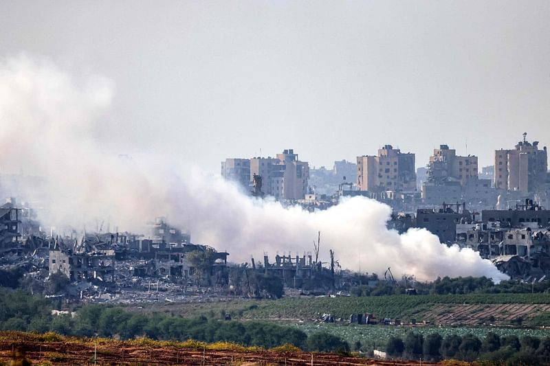 This picture taken on 31 October, 2023 from a position along the border with the Gaza Strip in southern Israel shows smoke plumes billowing during Israeli bombardment amid ongoing battles between Israel and the Palestinian Hamas movement