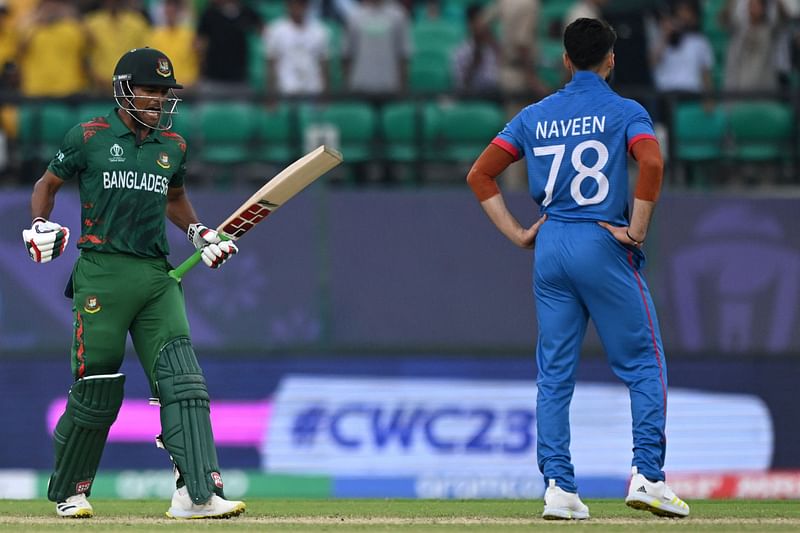 Bangladesh's Najmul Hossain Shanto (L) celebrates after winning the 2023 ICC Men's Cricket World Cup one-day international (ODI) match between Bangladesh and Afghanistan at the Himachal Pradesh Cricket Association Stadium in Dharamsala on October 7, 2023