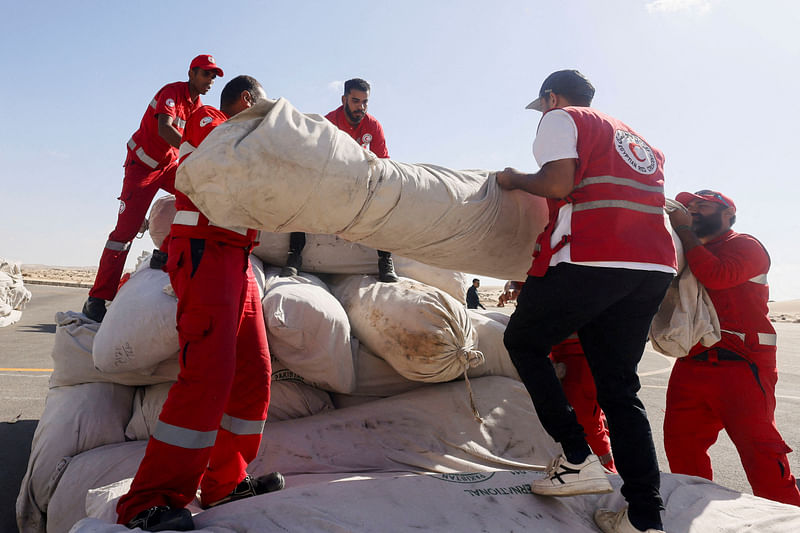 Egyptian Red Crescent members coordinate aid for Gaza, after United Nations Secretary-General Antonio Guterres visited the Rafah border crossing between Egypt and the Gaza Strip, at Al Arish Airport, Egypt, October 20, 2023