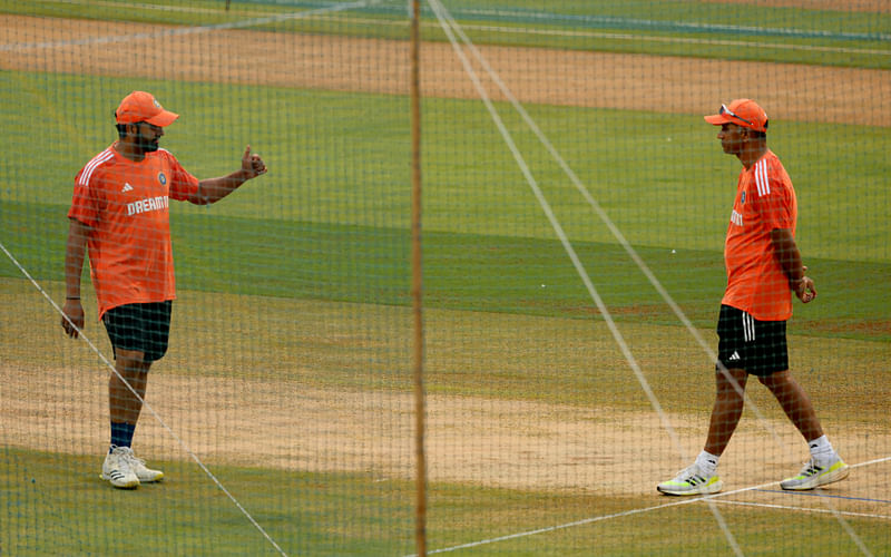 India's Rohit Sharma with head coach Rahul Dravid during practice session ahead of World Cup semi-final against New Zealand