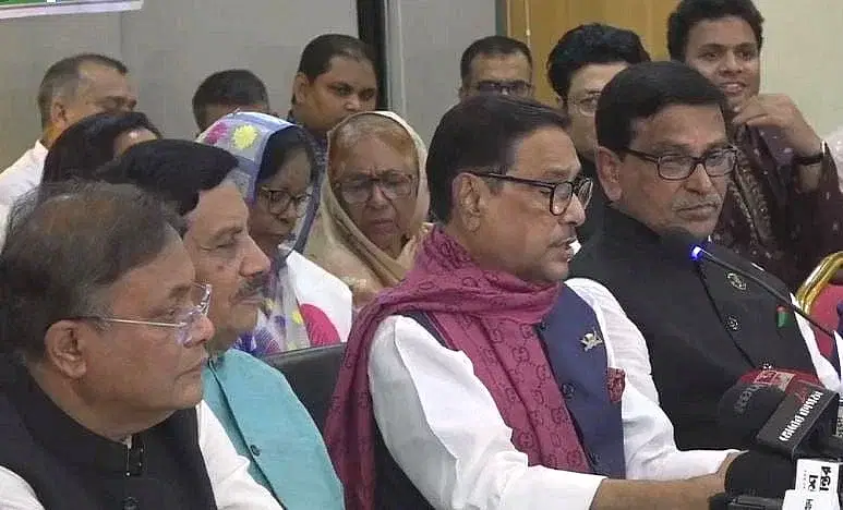 Awami League General Secretary Obaidul Quader reads out the names of the party's candidates for the 12th parliamentary election