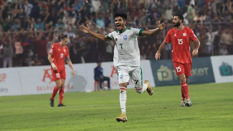 Bangladesh's Sheikh Morsalin celebrates a goal against Lebanon on 21 November in 2023