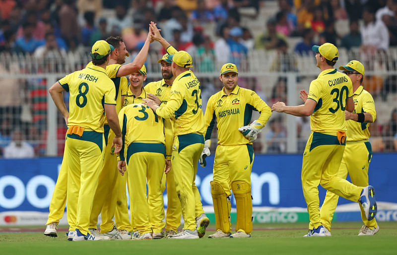 Australia's Josh Hazlewood celebrates with teammates after taking the wicket of South Africa's Rassie van der Dussen