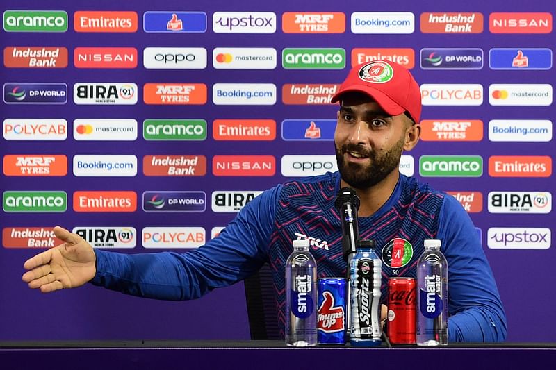 Afghanistan's captain Hashmatullah Shahidi addresses a press conference on the eve of their 2023 ICC Men's Cricket World Cup one-day international (ODI) match against South Africa at the Narendra Modi Stadium in Ahmedabad on 9 November, 2023