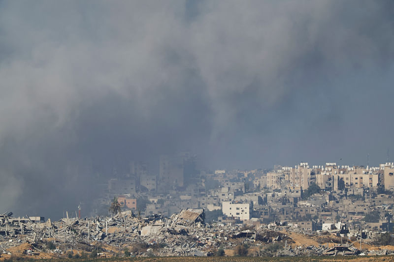 Smoke rises after Israeli air strikes in Gaza, as seen from southern Israel, amid the ongoing conflict between Israel and the Palestinian group Hamas, on 21 November, 2023