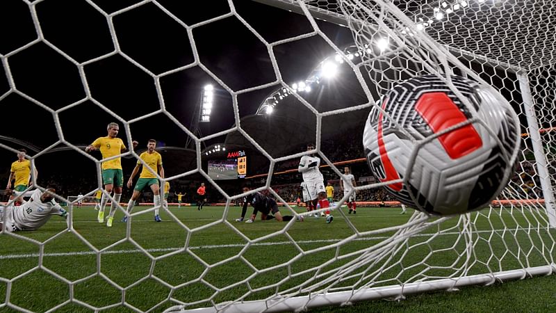 ustralia's Jamie McLaren (yellow #9) scores a goal during the 2026 FIFA World Cup Asian qualification football match between Australia and Bangladesh played in Melbourne on November 16, 2023