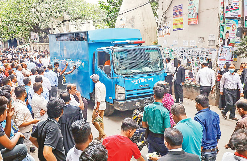 A prison van transporting BNP leaders to jail from CMM Court in Dhaka