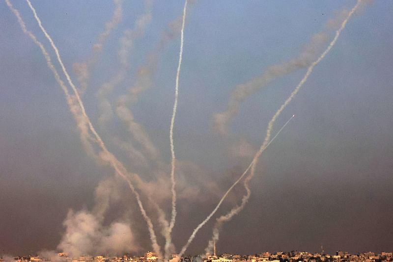 This picture taken from the southern Gaza Strip shows a salvo of rockets fired towards Israel on December 4, 2023, amid continuing battles between Israel and the Palestinian militant group Hamas.