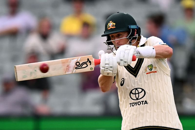 Australian batsman Marnus Labuschagne plays a shot on the first day of the second cricket Test match between Australia and Pakistan at the Melbourne Cricket Ground (MCG) in Melbourne on 26 December, 2023