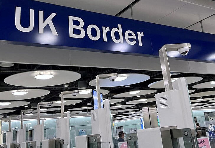 A sign is seen at the arrivals passport control area of Terminal 5, at Heathrow Airport, London, Britain, March 23, 2023