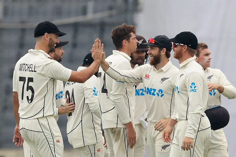 Kane Williamson celebrates with other players after taking the catch of Zakir Hossain in the second Test between Bangladesh and New Zealand at Sher-e-Bangla National Cricket Stadium in Dhaka on 6 December in 2023