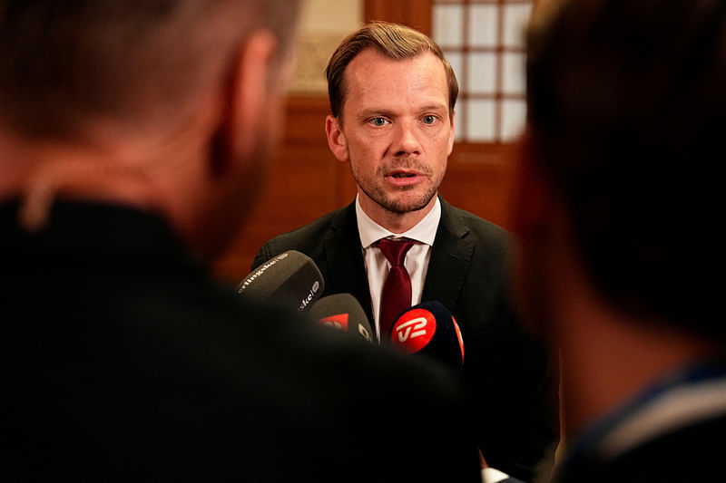 Denmark's Minister of Justice Peter Hummelgaard talks to the media after a vote for a new law against inappropriate treatment of writings of importance to religious communities, in Copenhagen, Denmark on 7 December, 2023