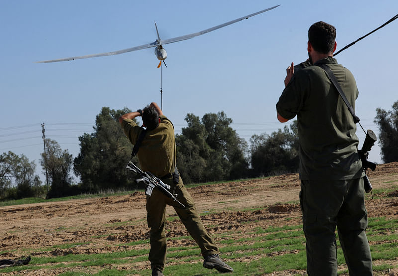 An Israeli military tactical drone operator launches a drone near the Gaza border, amid the ongoing conflict between Israel and the Palestinian Islamist group Hamas, in southern Israel, December 30, 2023