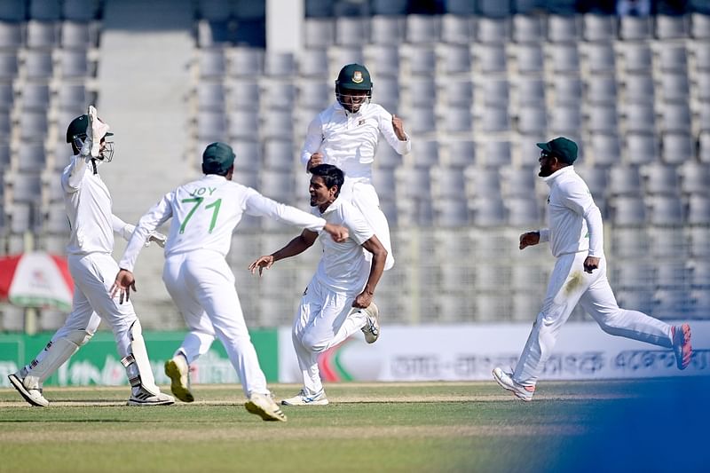 Taijul reacts after he taking the wicket of New Zealand batsman Kane Williamson