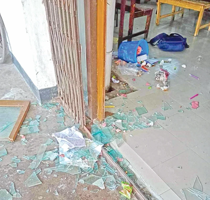 Photos show shattered glass of a door of the library room at Haji Mohammad Mohsin Hall in Dhaka University after  a 5.6 magnitude earthquake jolted Bangladesh on 2 December 2023.