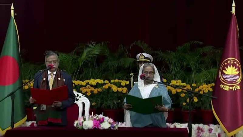 President Mohammed Shahabuddin administers the oath of Prime Minister Sheikh Hasina at Bangabahban inn Dhaka on 11 January 2024.