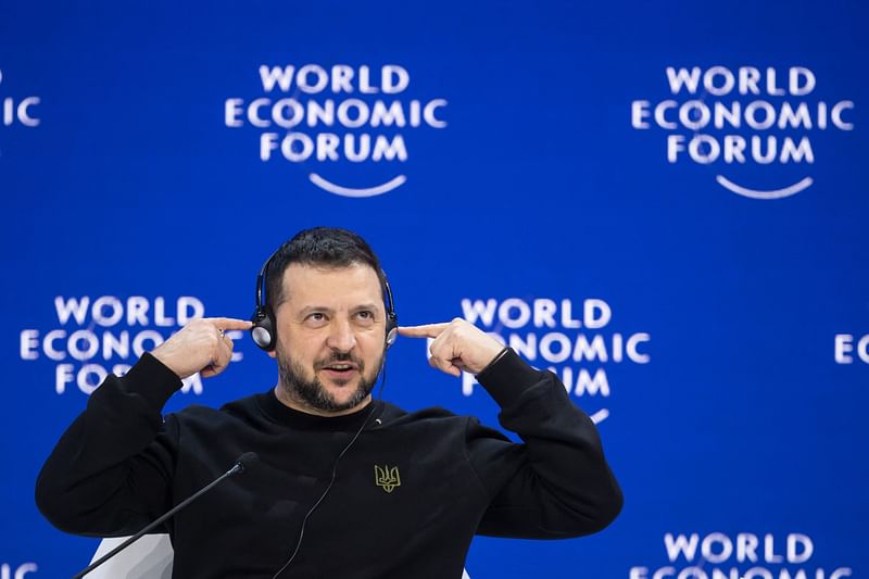 Ukrainian President Volodymyr Zelensky gestures while addressing the assembly at the World Economic Forum (WEF) annual meeting in Davos, on 16 January, 2024