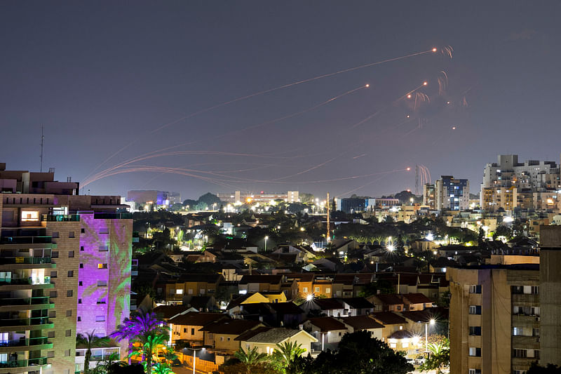 Israel's Iron Dome anti-missile system intercepts rockets launched from the Gaza Strip, amid the ongoing conflict between Israel and the Palestinian Islamist group Hamas, as seen from Ashkelon, Israel, 1 January, 2024