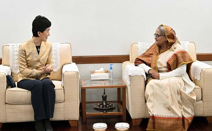 Chinese Communist Party's Vice-Minister of the International Department of the central committee Sun Haiyan (L) calls on Bangladesh Prime Minister Sheikh Hasina at her official residence, Ganabhaban, in Dhaka on 25 January in 2024