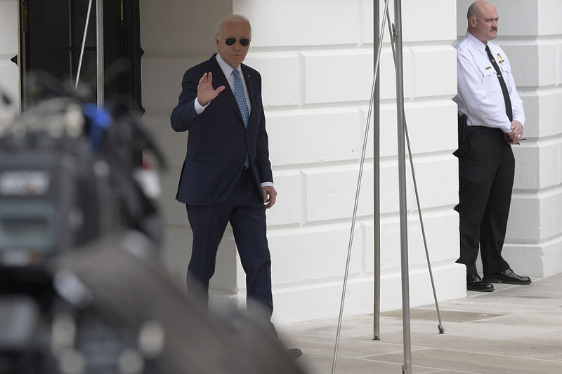 US President Joe Biden is talking with journalists before departing for Joint Base Andrews en route to Palm Beach, Florida, on the South Lawn of the White House in Washington D.C., USA, on 30 January, 2024