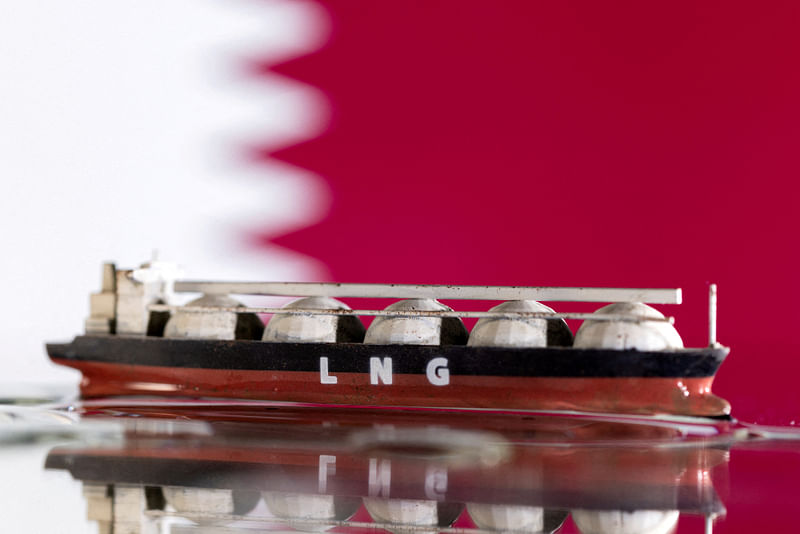 Model of LNG tanker is seen in front of Qatar's flag in this illustration taken on 19 May, 2022