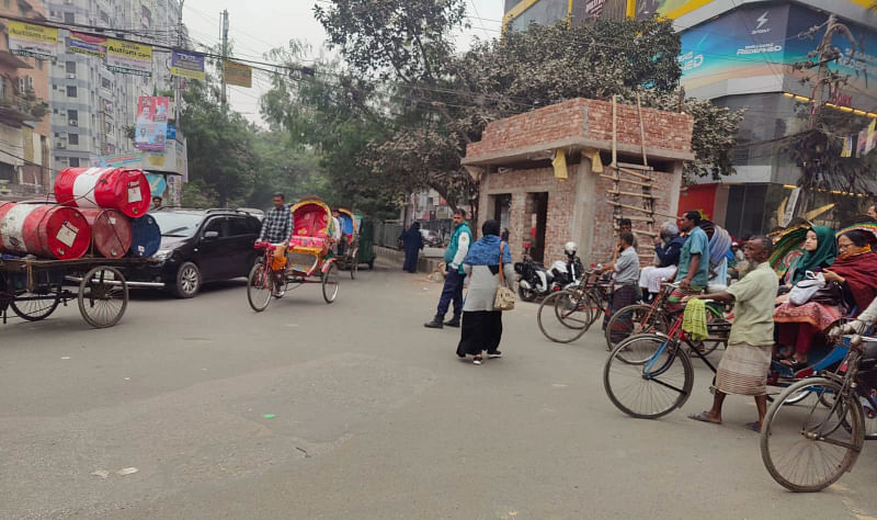 A  police box is under construction on the Shia Mosque road intersection in Mohammadpur, Dhaka. This photo was taken on 24 January 2024.