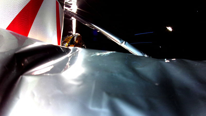 This handout image released by Astrobotic on January 8, 2024 shows the first image from Astrobotic's Peregrine Lunar Lander in space showing Multi-Layer Insulation (MLI) in the foreground