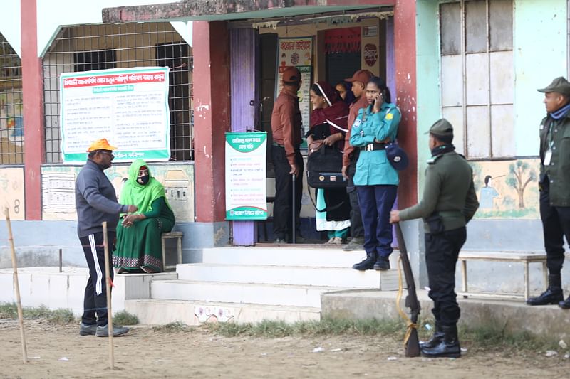 A few voters are seen arriving at the Umar Shah Tera Ratan Primary School polling centre in Sylhet during the 12th parliamentary elections on 7 January 2023.