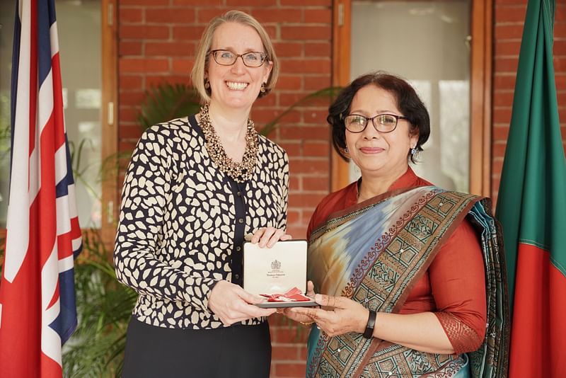 British high commissioner to Bangladesh Sarah Cooke presented the Insignia of an honorary member of the Most Excellent Order of the British Empire to Shehlina Ahmed, a former British High Commission Dhaka employee