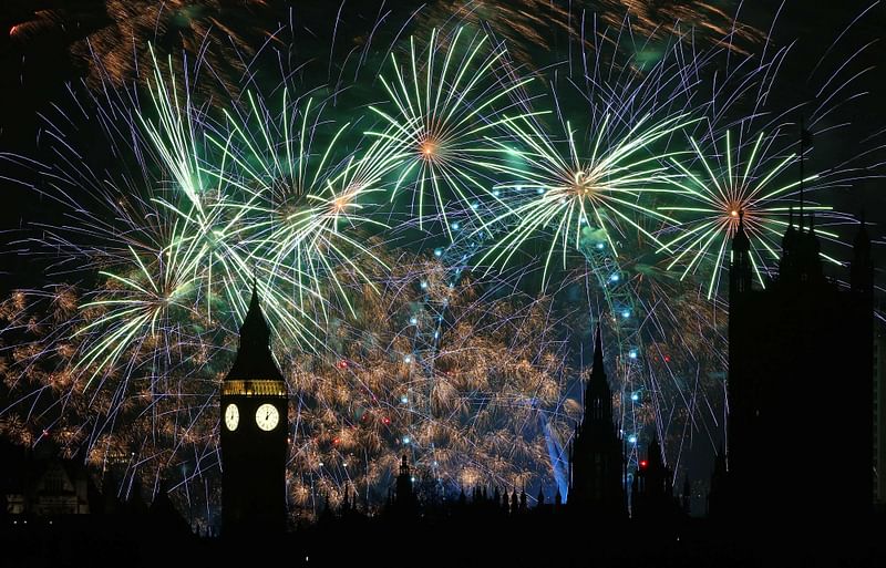 ireworks explode around the London Eye and The Elizabeth Tower, commonly known by the name of the clock's bell, "Big Ben", at the Palace of Westminster, home to the Houses of Parliament, in central London, just after midnight on 1 January, 2024