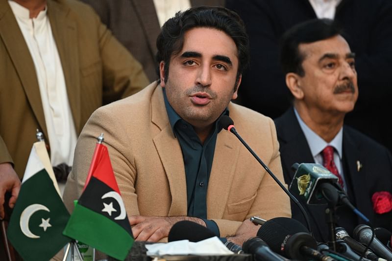 Pakistan Peoples Party (PPP) chairman Bilawal Bhutto Zardari(L) speaks during a press conference in Islamabad on 13 February, 2024