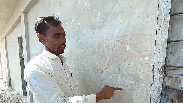 A bullet from the other side of the border hit the wall of Nurul Islam's shop at Uttarpara in Howaikang union of Teknaf, Cox's Bazar. He points to the bullet mark. 10 February