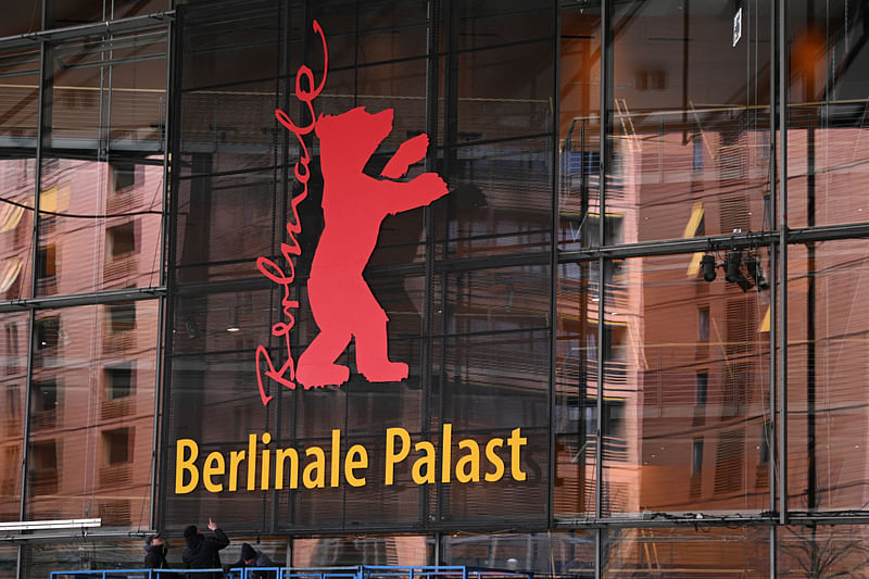 Workers finish the installation of the Berlinale mascot logo at the venue entrance of the "Berlinale Palast" at the 74th Berlinale International Film Festival in Berlin, Germany 9 February, 2024.