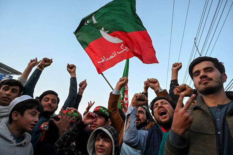 Supporters of Pakistan Tehreek-e-Insaf (PTI) party protest outside the office of a Returning Officer in Peshawar on 9 February, 2024, against the alleged rigging in Pakistan's national election results.