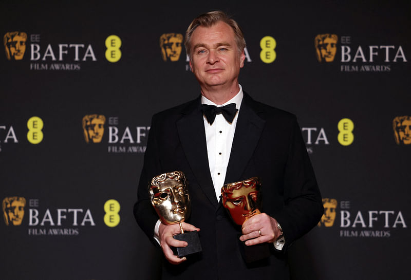 Christopher Nolan, winner of the awards for Director and Best Film for 'Oppenheimer', poses in the winners' room during the 2024 British Academy of Film and Television Awards (BAFTA) at the Royal Festival Hall in the Southbank Centre, London, Britain, 18 February, 2024.