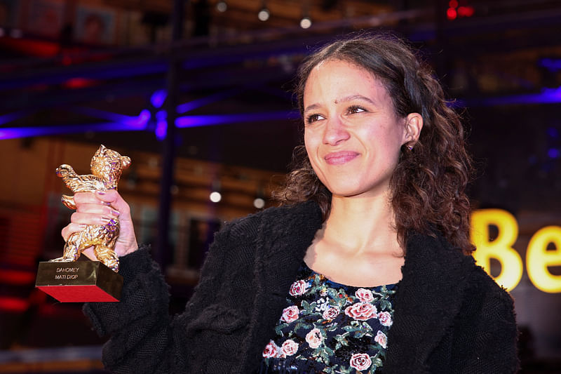 Director Mati Diop poses with the Golden Bear for Best Film for 'Dahomey', after the award ceremony of the 74th Berlinale International Film Festival in Berlin, Germany, 24 February, 2024.