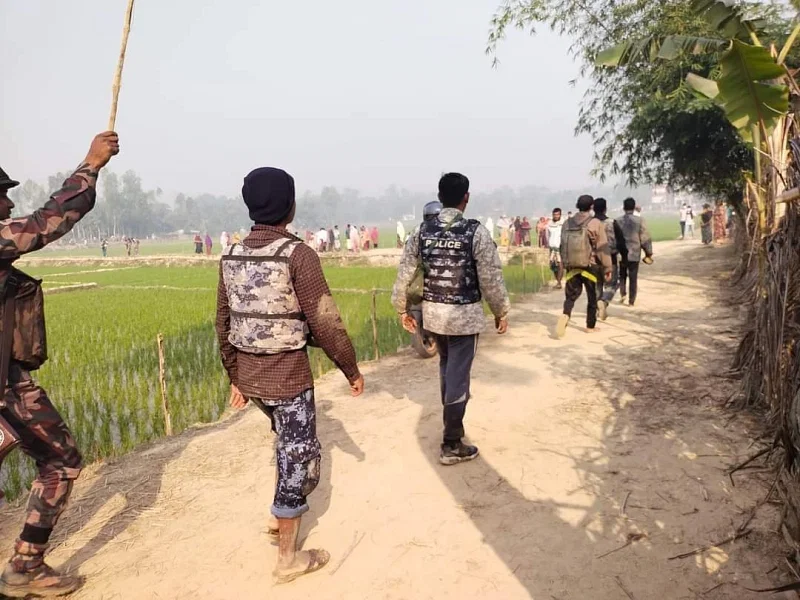 Members of Myanmar Border Guard Police (BGP) walk as they crossed the Rahmater Beel border in Palongkhali union parishad of Ukhiya upazila, Cox’s Bazar on 6 February 2024.