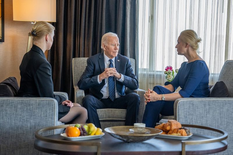 In this photo courtesy of The White House, obtained on 22 February, 2024, US President Joe Biden (C) meets with Yulia Navalnaya (R), widow of Kremlin opposition leader Alexei Navalny, who died last week in a Russian prison, and daughter Dasha Navalnaya (L) in San Francisco, California