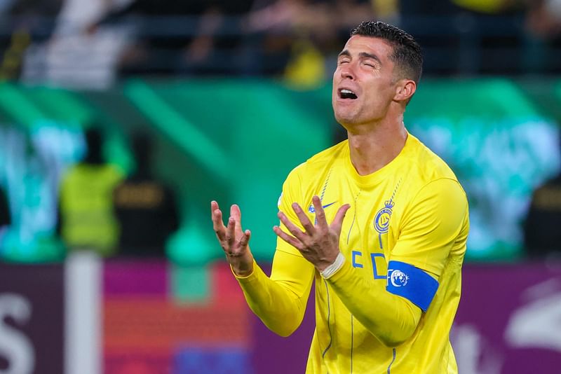 Nassr's Portuguese forward #07 Cristiano Ronaldo reacts during the AFC Champions League football match between Saudi Arabia's Al-Nassr and UAE's Al-Ain at Al-Awal Park Stadium in Riyadh on 11 March 2024.