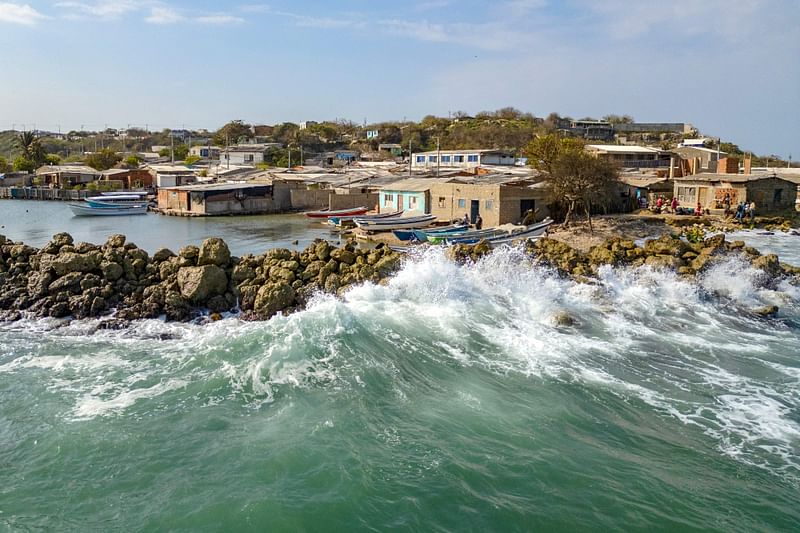 Aerial view of houses affected by sea level rise in Tierra Bomba Island, Cartagena, Colombia, taken on 24 February, 2024