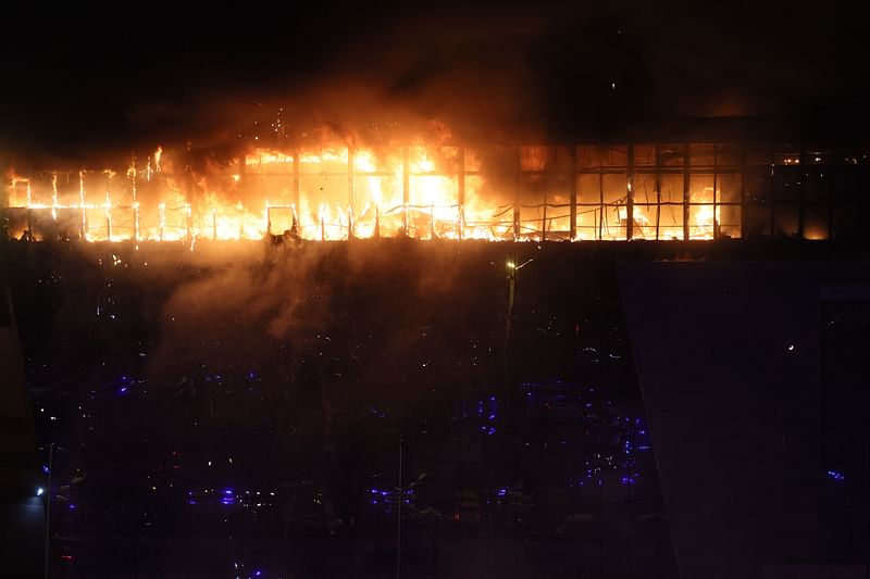 A view shows the burning Crocus City Hall concert hall following the shooting incident in Krasnogorsk, outside Moscow, on March 22, 2024.