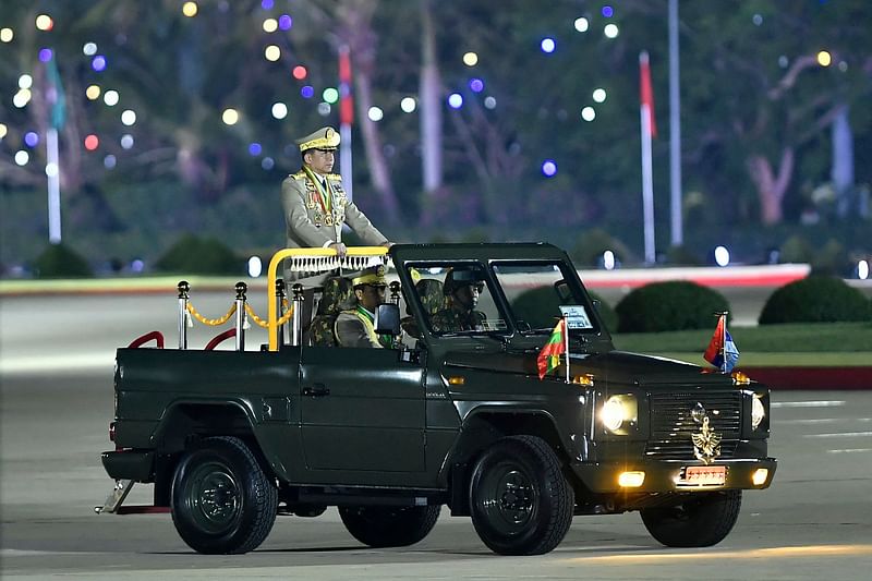 Myanmar’s junta chief military Min Aung Hlaing arrives to deliver a speech during a ceremony to mark the country’s Armed Forces Day in Naypyidaw on 27 March, 2024