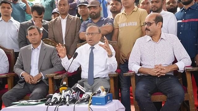 Minister Tajul Islam and DNCC Mayor Atiqul Islam attend a lake cleaning programme in Uttara on 20 March 2024.